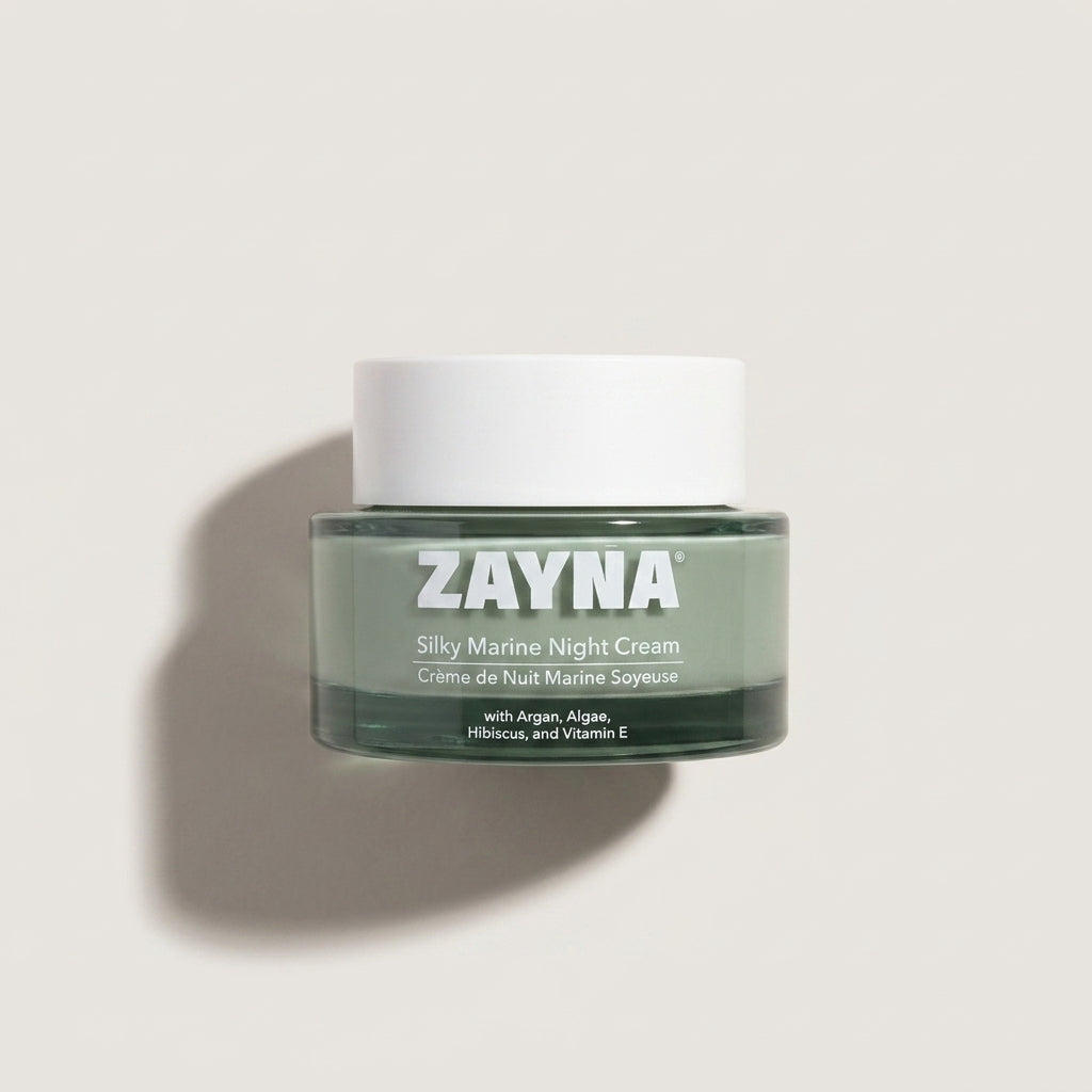 ZAYNA Silky Marine Night Cream in a green glass jar with a white lid, designed for skin hydration and firmness.